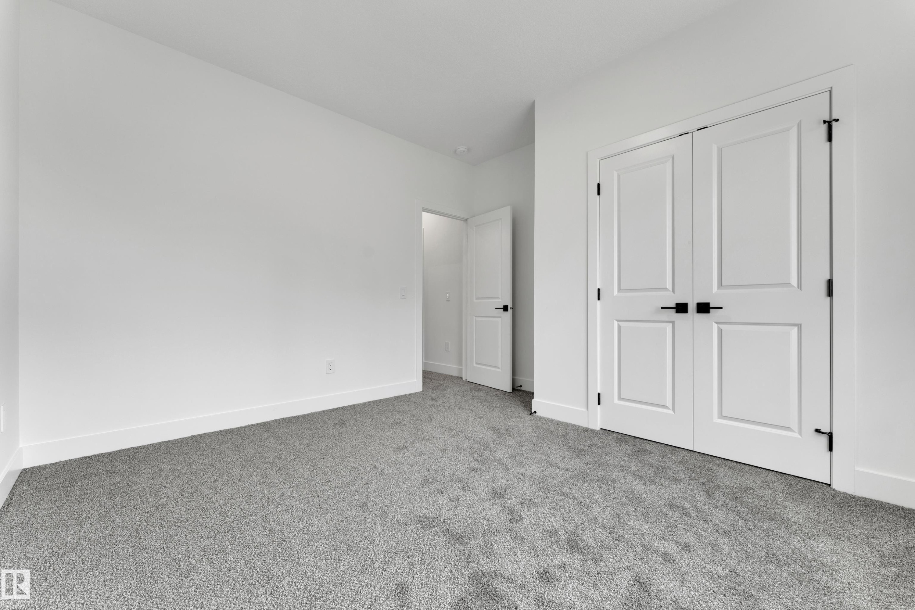 Neutral color palette with light gray carpeting - 261 Linden Loop, Leduc, AB