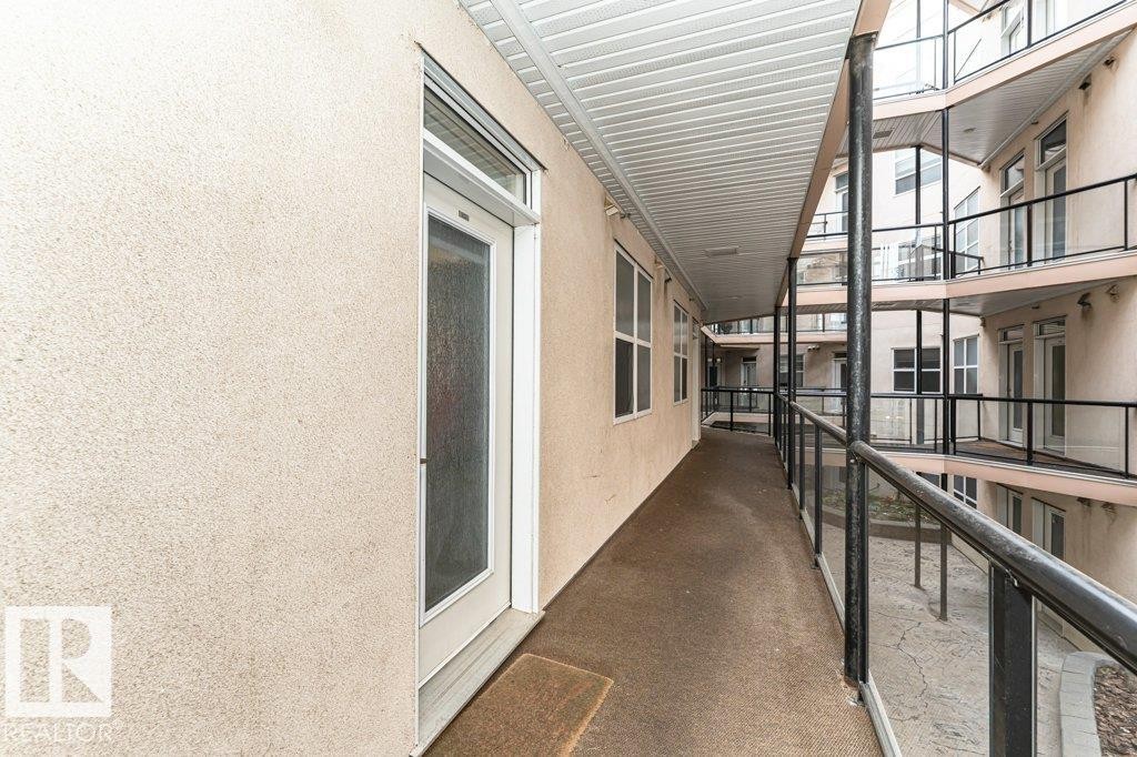 Entry door with transom window - #202 9503 101 Av Nw, Edmonton, AB