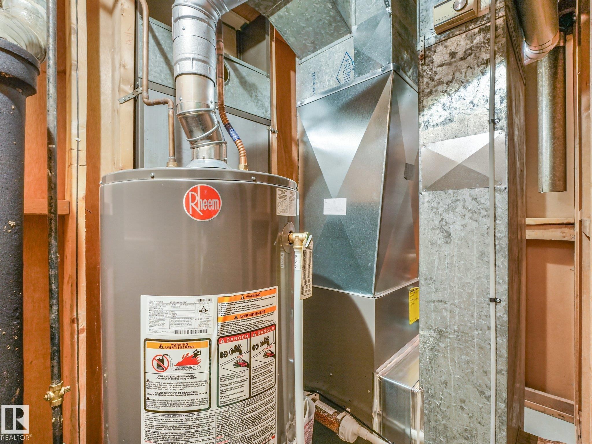 Rheem water heater with copper piping and galvanized ductwork - 5904 94 Avenue Nw, Edmonton, AB