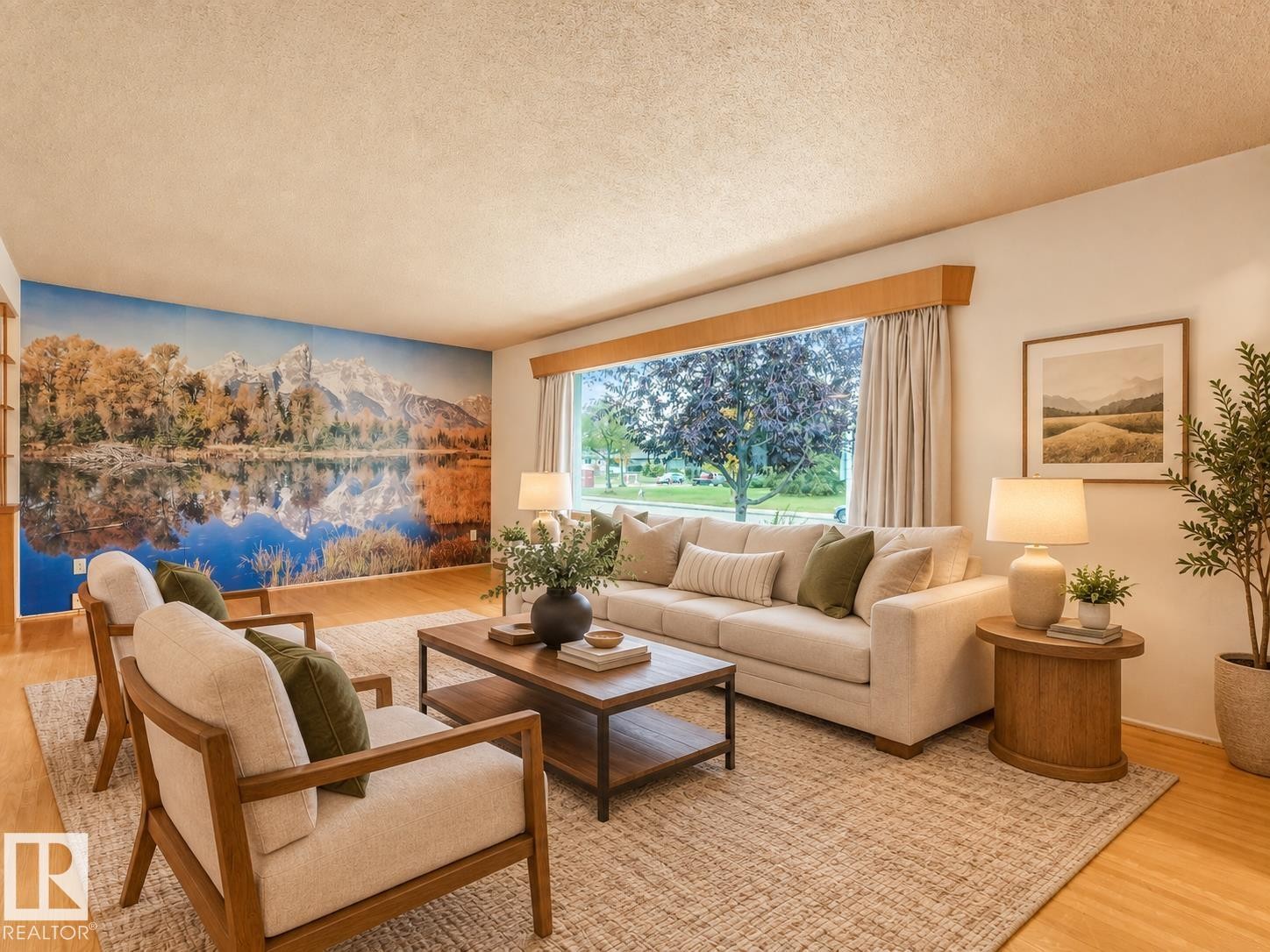 Expansive living area with wood-finish flooring, a large picture window, and a decorative wall mural - 5904 94 Avenue Nw, Edmonton, AB