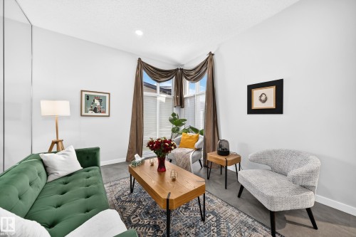 Brightly lit interior with wood-finish flooring - 5830 181 Street Nw, Edmonton, AB 