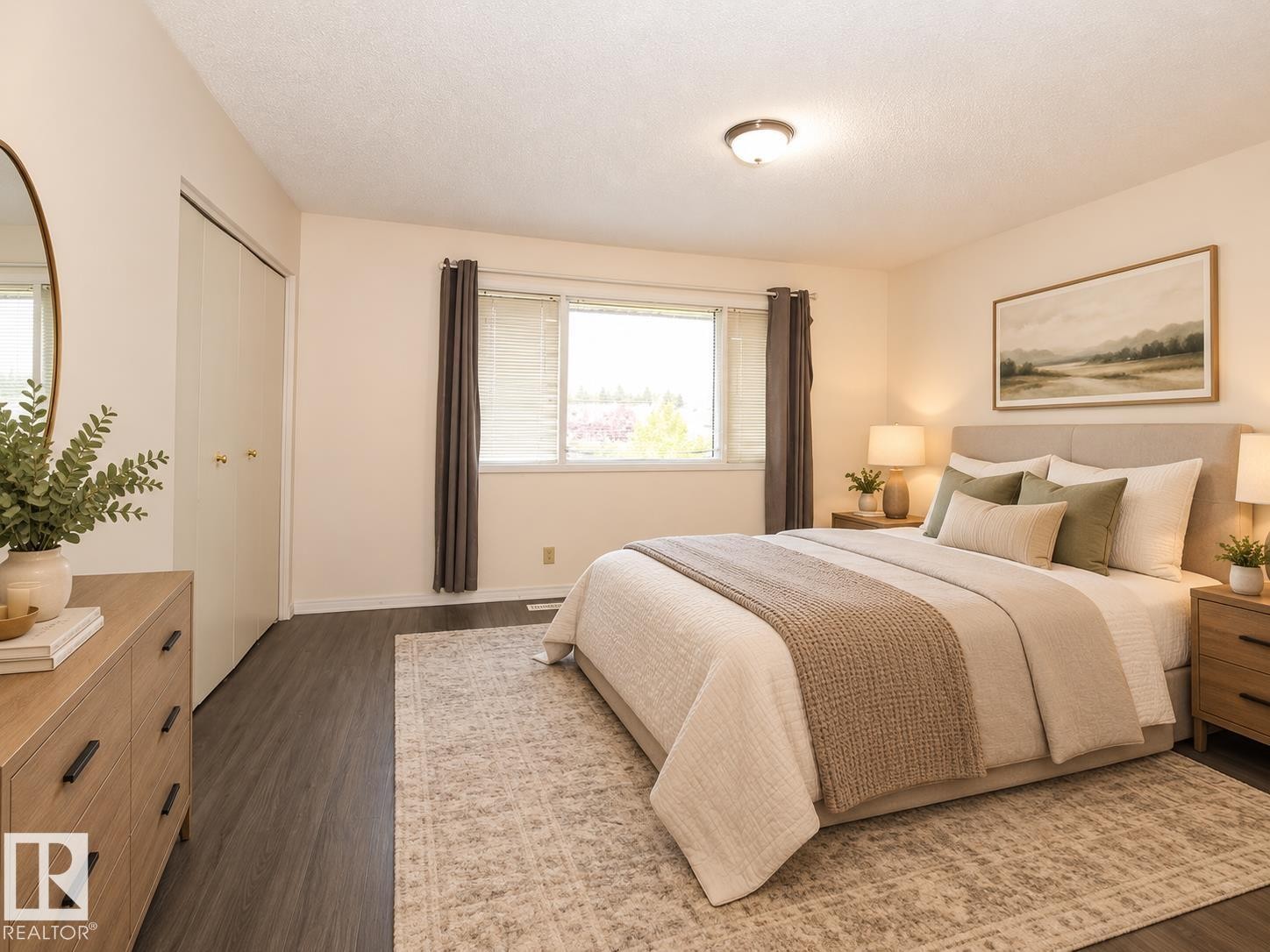 Wood-finish flooring, flush mount ceiling light, and built-in closet with bi-fold doors - 11393 22 Avenue Nw, Edmonton, AB