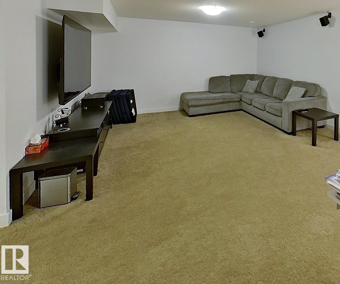 Recessed ceiling beam, wall-mounted speakers, and recessed lighting - 40 Jamison Crescent, St. Albert, AB