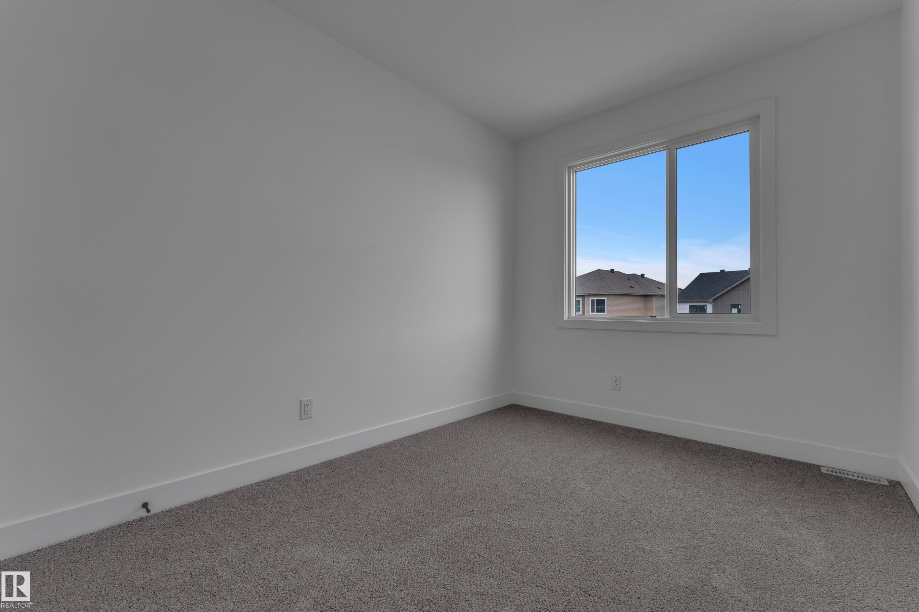 Natural light via a large window - 178 Munn Way, Leduc, AB