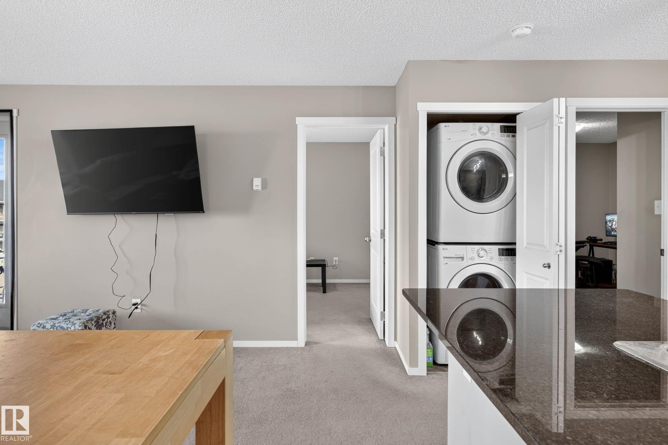 Stackable laundry appliances within a dedicated closet - #408 25 Element Dr, St. Albert, AB