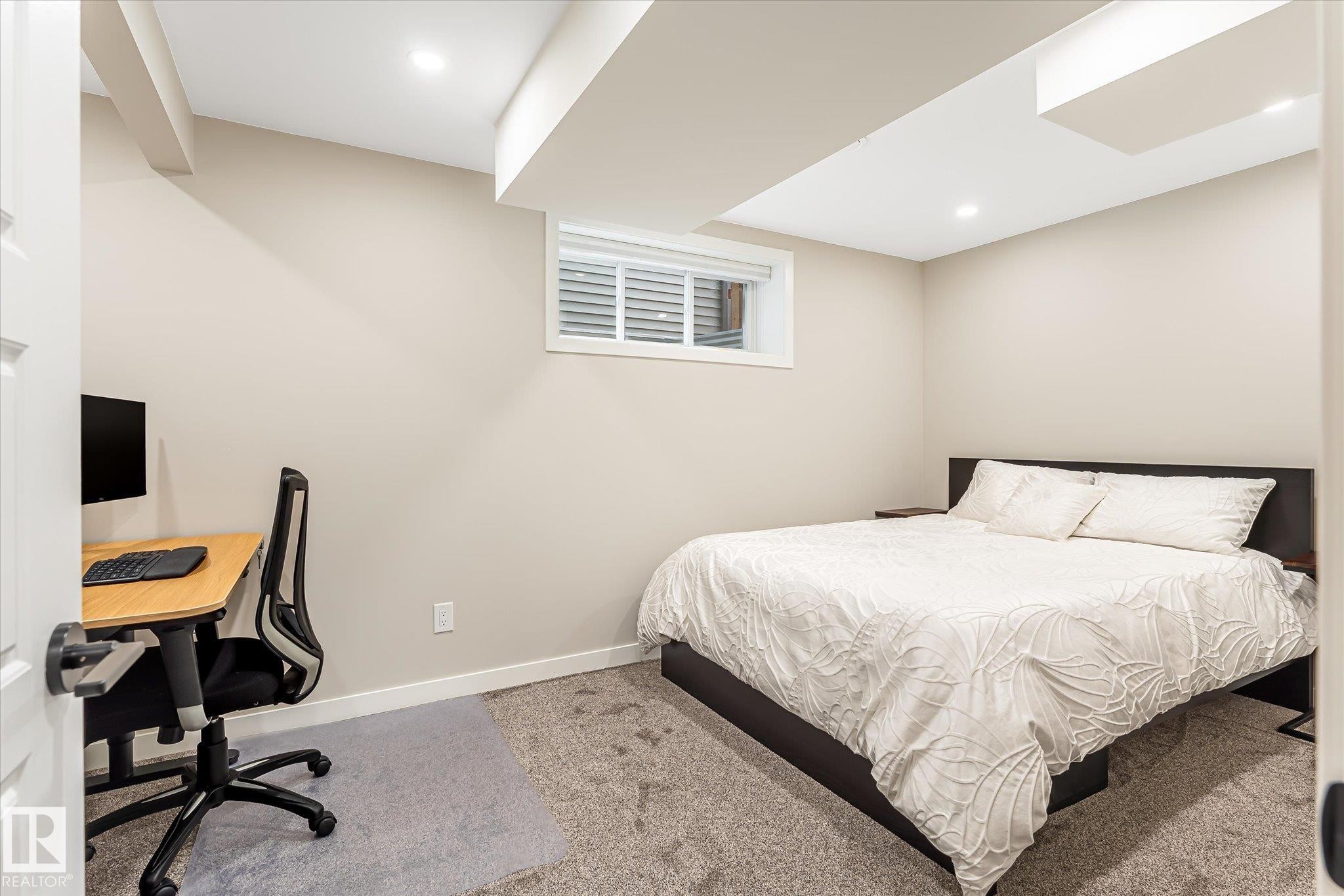 Recessed lighting, window with blinds, light-colored walls, and carpet flooring - 21935 91 Avenue Nw, Edmonton, AB