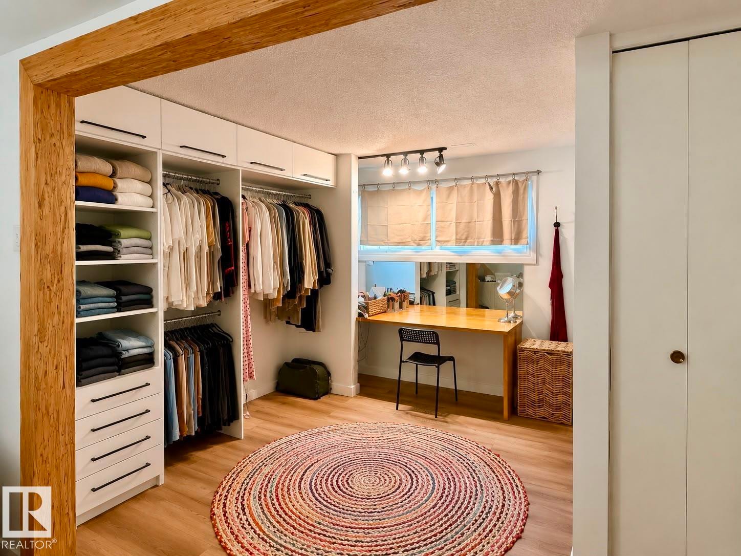 Built-in custom closet system with open shelving and drawers - 5 Gilmore Crescent, St. Albert, AB