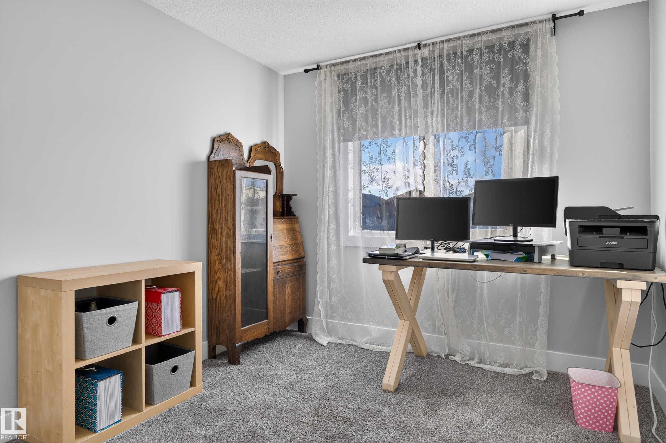 Room featuring neutral walls, grey carpeting, and a rectangular window - 798 Berg Loop, Leduc, AB
