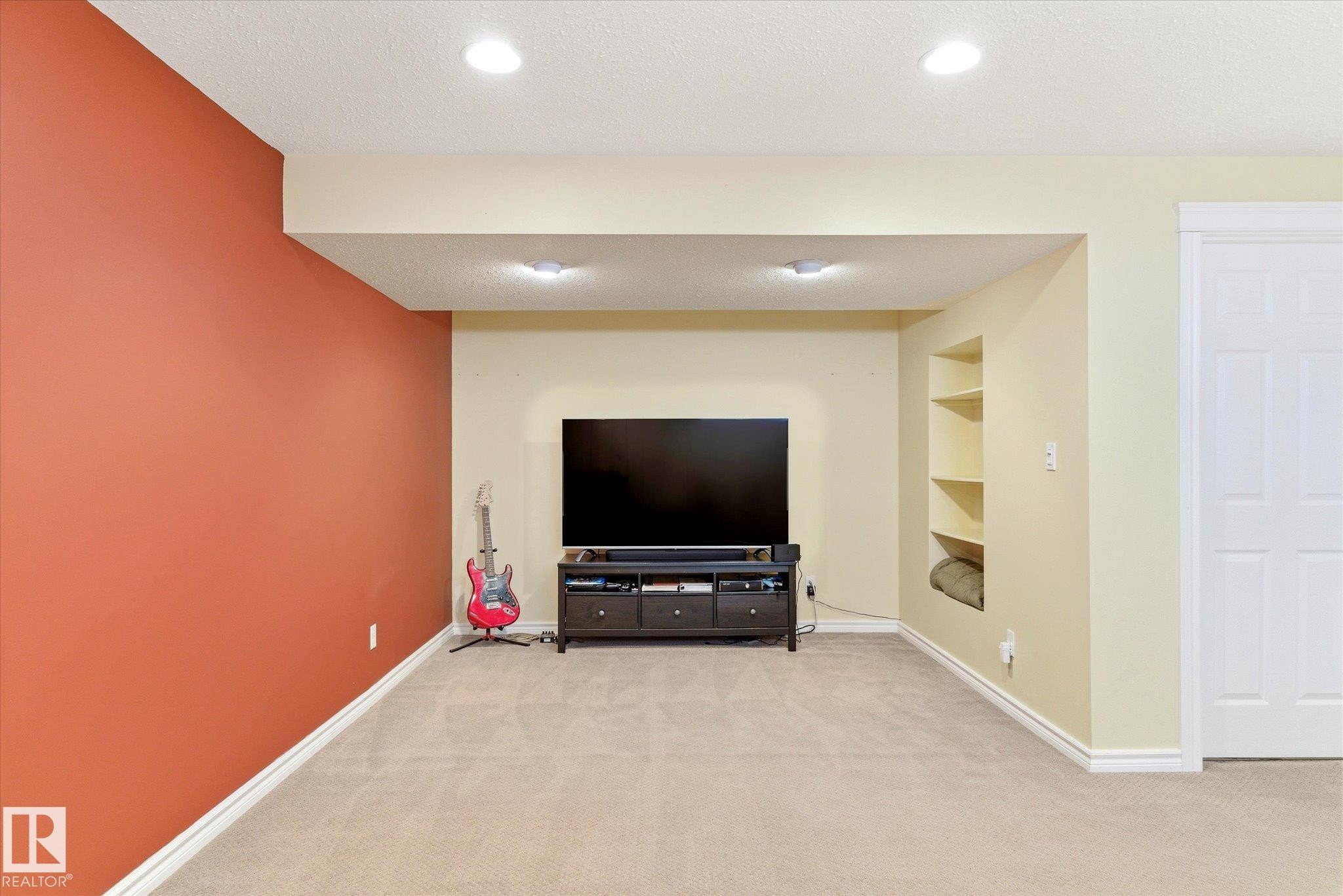 Recessed lighting, built-in shelving, and a paneled door - 2550 Rabbit Hill Road Nw, Edmonton, AB