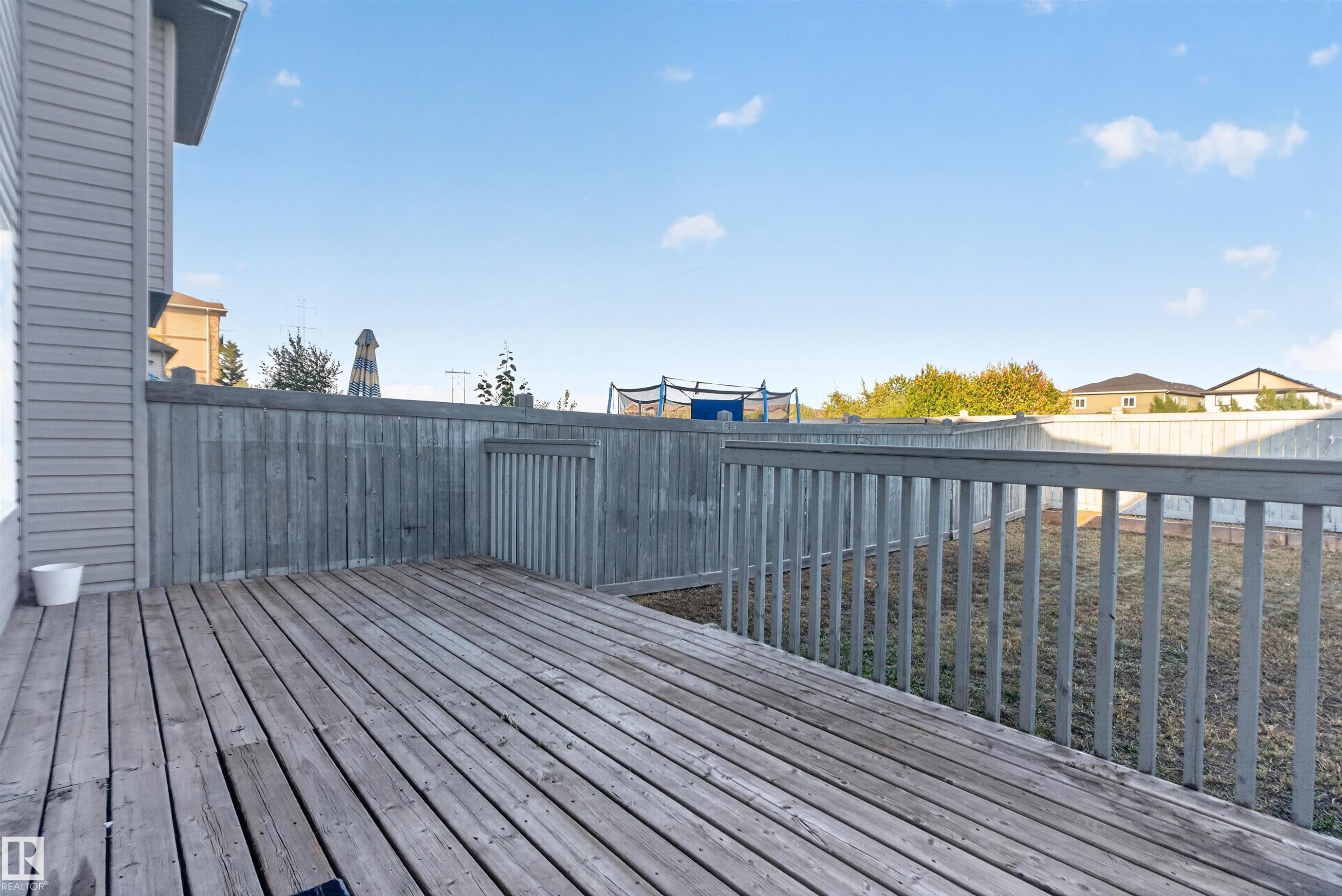 Wood deck with railing and privacy fencing - 2145 28 Street Nw, Edmonton, AB