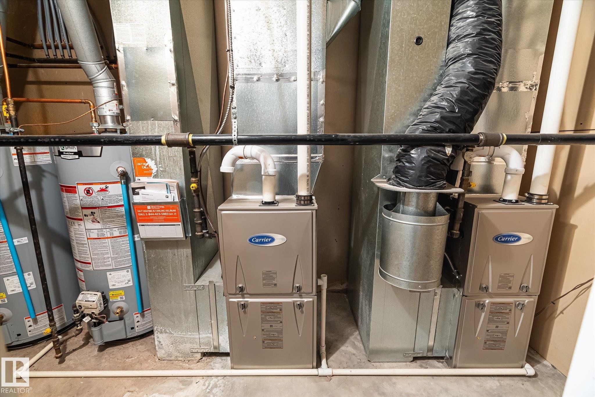 Dual water heaters, two Carrier furnaces, and extensive galvanized ductwork - 771 Johns Road Nw, Edmonton, AB