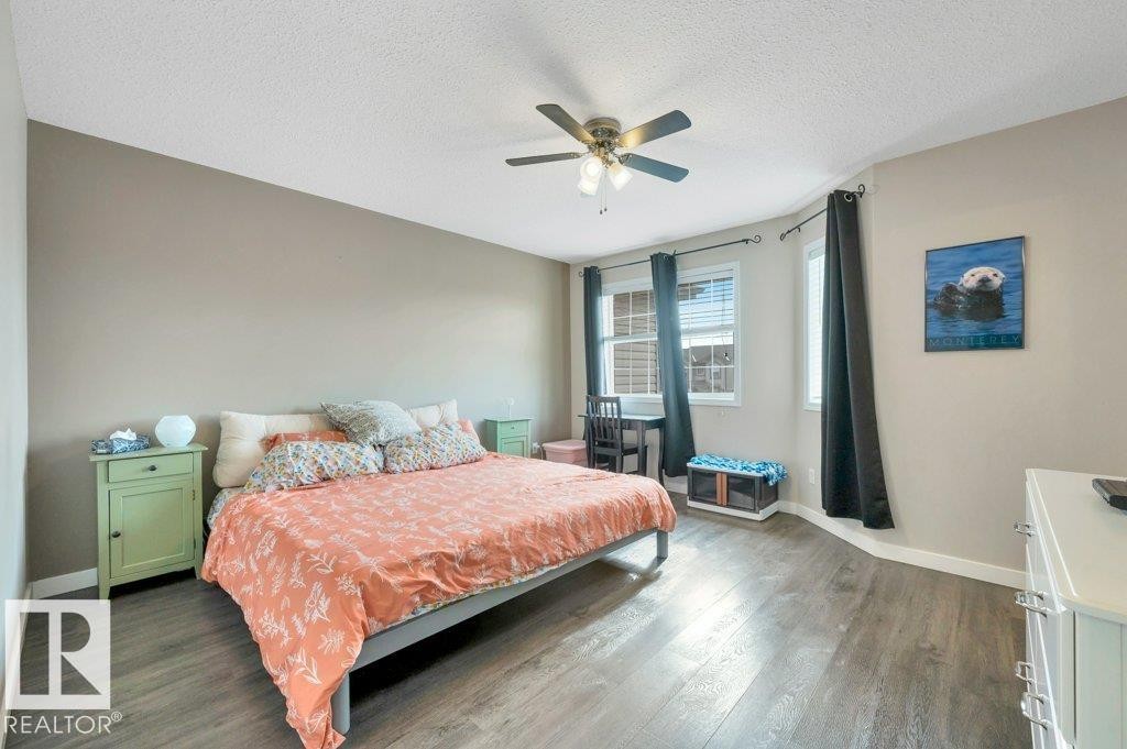 Vinyl plank flooring, ceiling fan, and vinyl windows with window coverings - 11448 169 Avenue Nw, Edmonton, AB