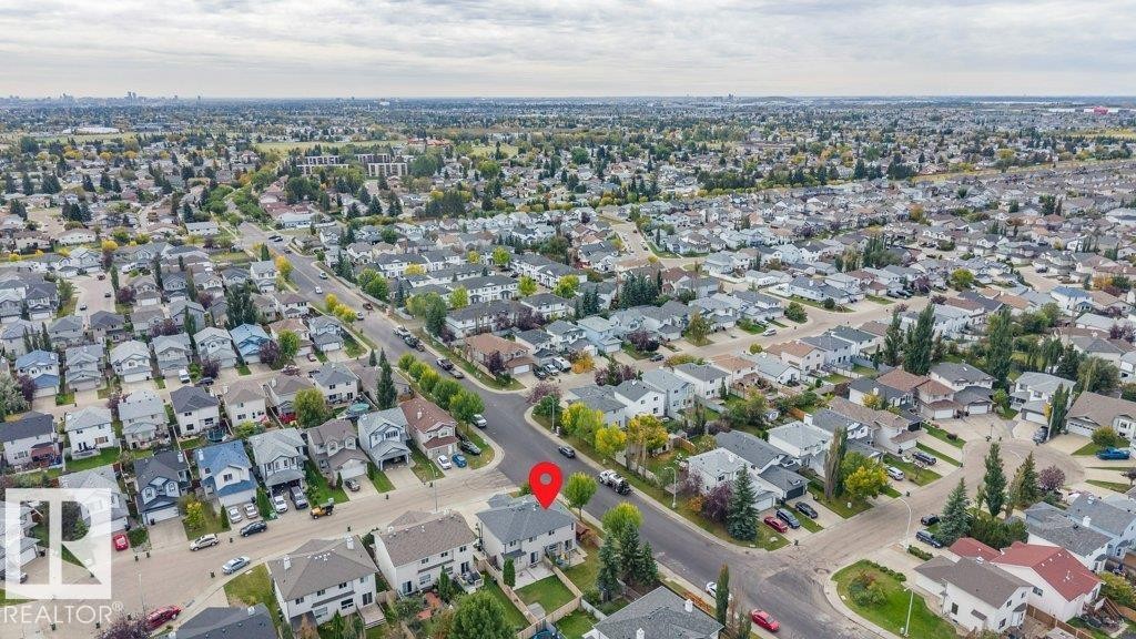Residential neighborhood featuring mature trees and established homes - 11448 169 Avenue Nw, Edmonton, AB