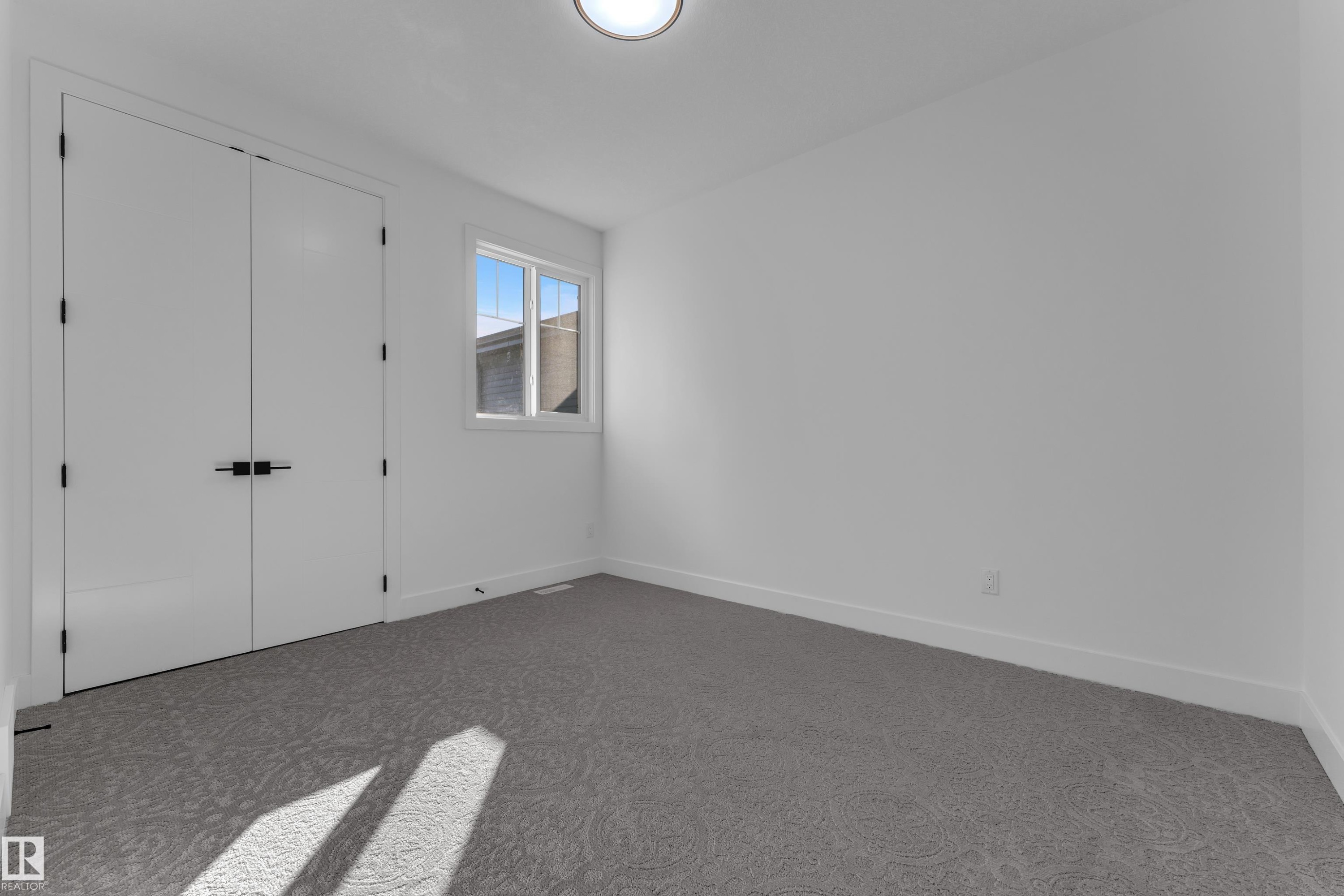 Window with white trim - 3604 44 Avenue, Beaumont, AB