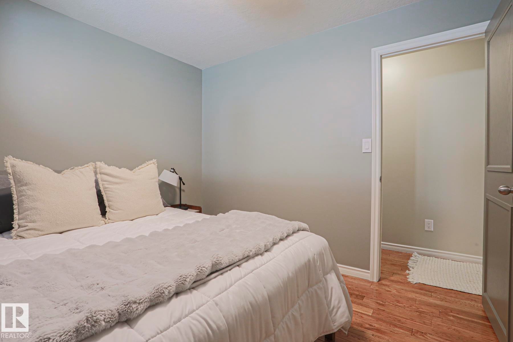 Light gray painted walls with wood-finish flooring - 2 Hillview Crescent, Sherwood Park, AB