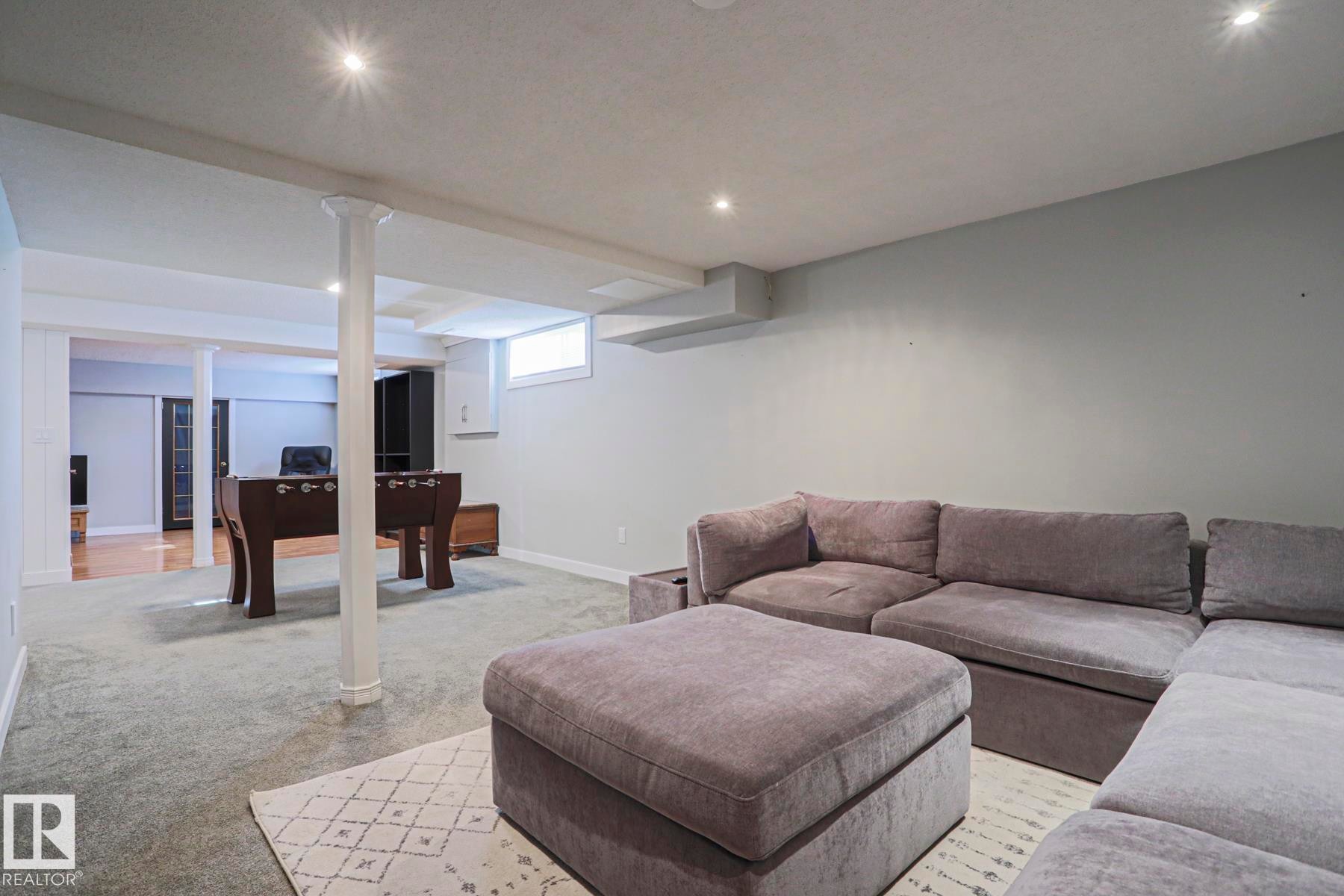 Recessed lighting, carpeted flooring, painted walls, and a visible window - 2 Hillview Crescent, Sherwood Park, AB