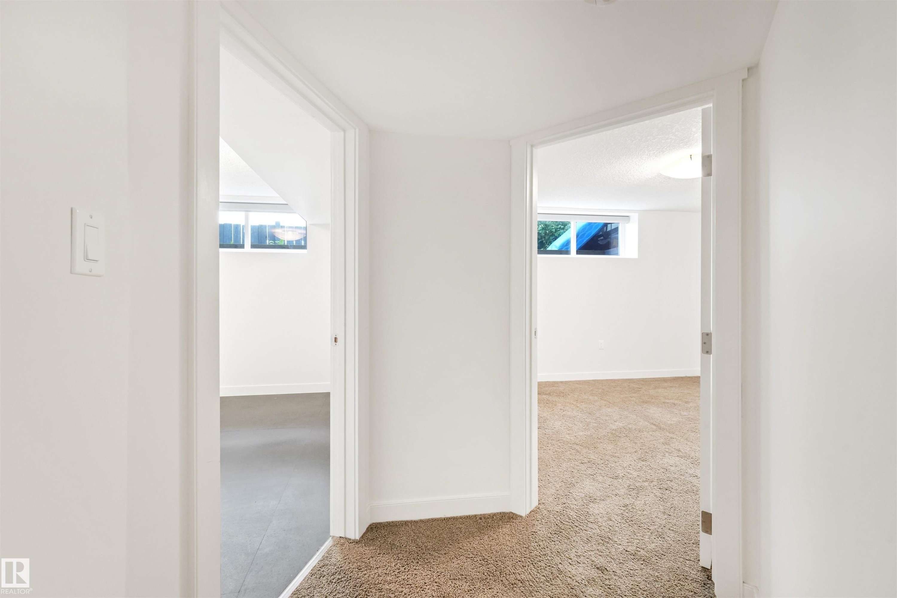White painted walls, white trim, and doors - 8212 148 Street Nw, Edmonton, AB