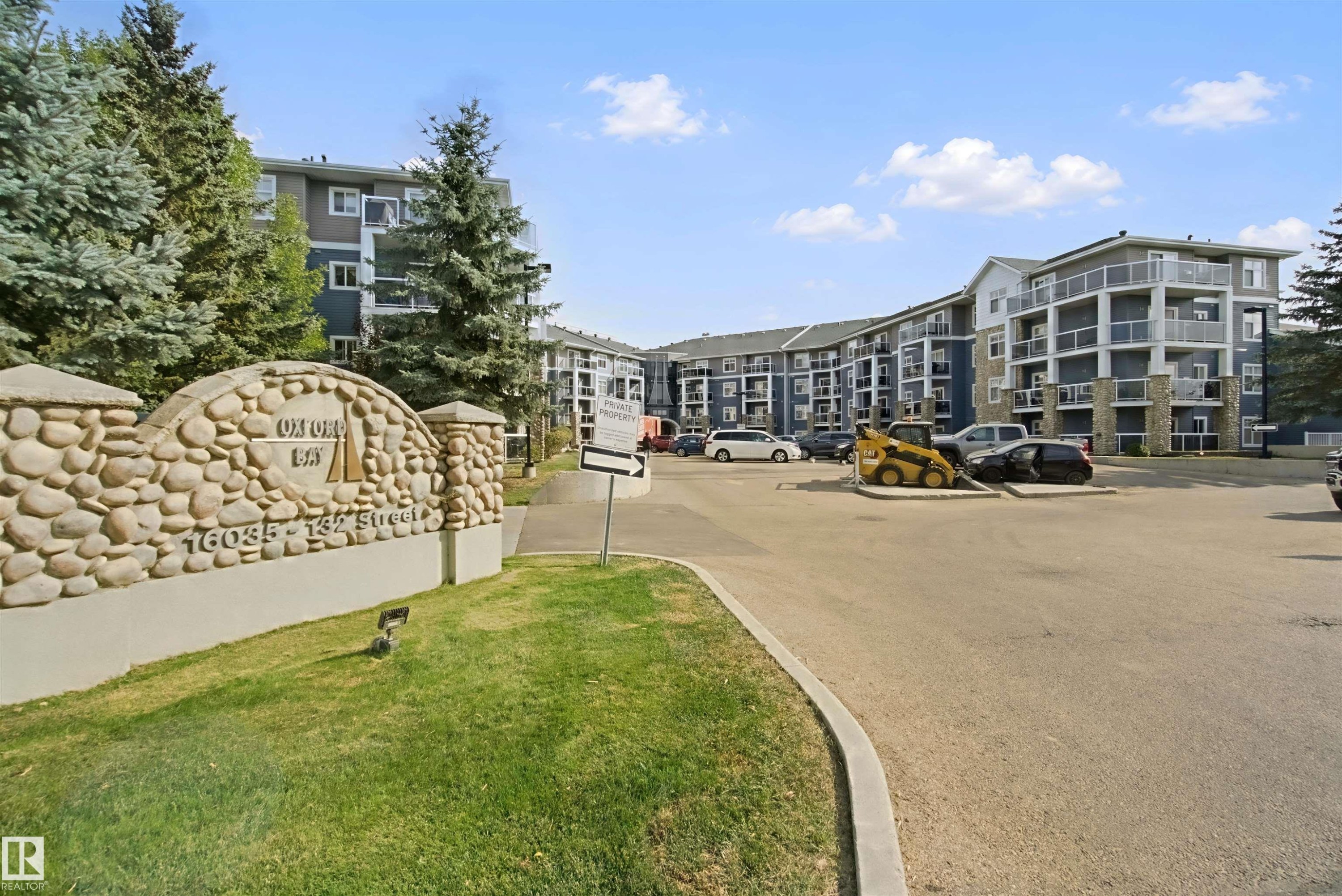 Stone-clad entry signage with address details - #208 16035 132 St Nw, Edmonton, AB