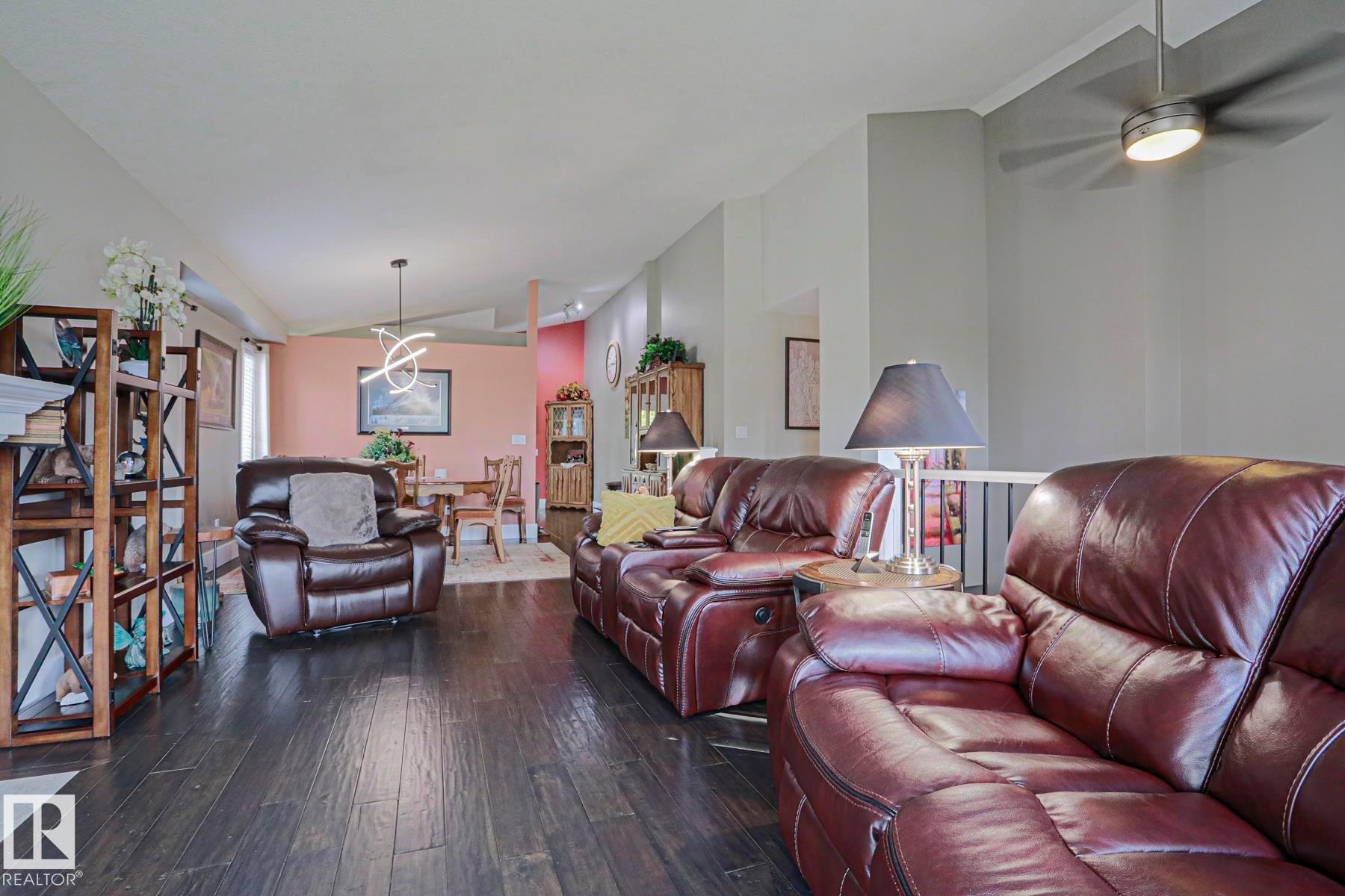 Wood-finish flooring throughout the living area - 3815 41 Street Nw, Edmonton, AB