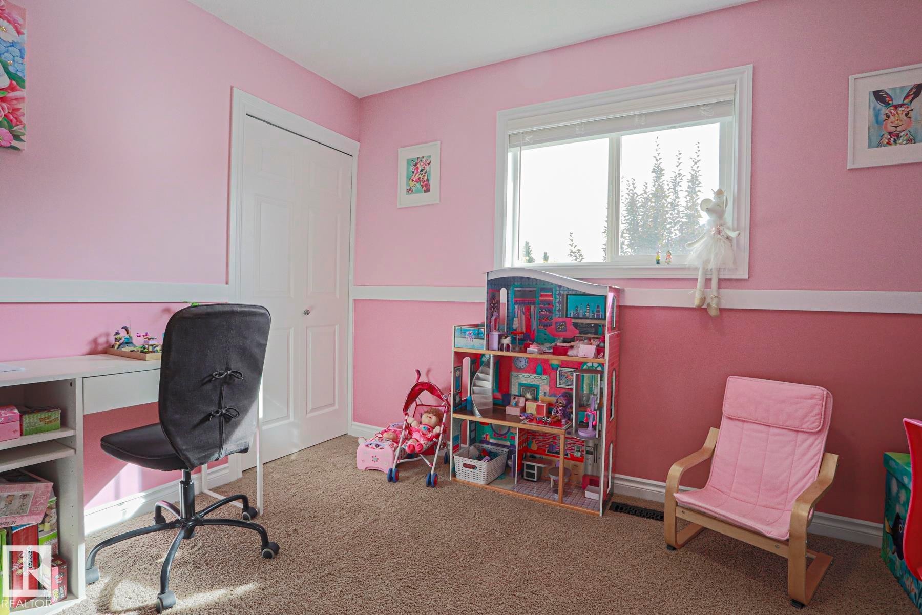 Wall-to-wall carpeting, window with natural illumination, and a built-in closet with bi-fold doors - 3815 41 Street Nw, Edmonton, AB