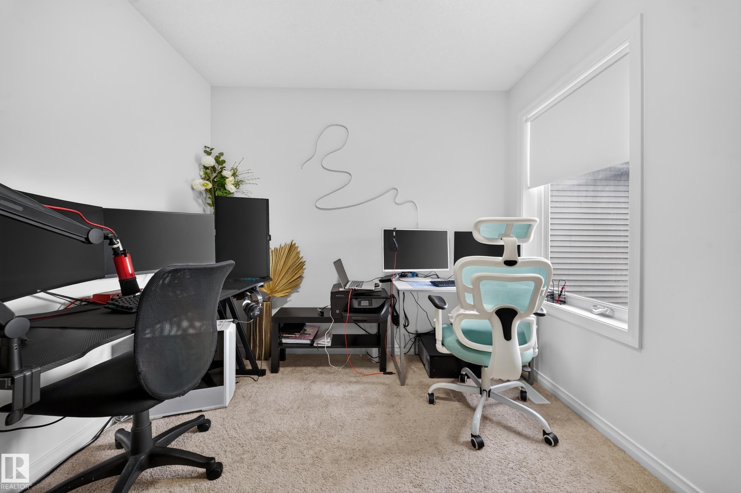 Carpeted flooring, white walls, and a window with blinds - 4104 3 Avenue Sw, Edmonton, AB