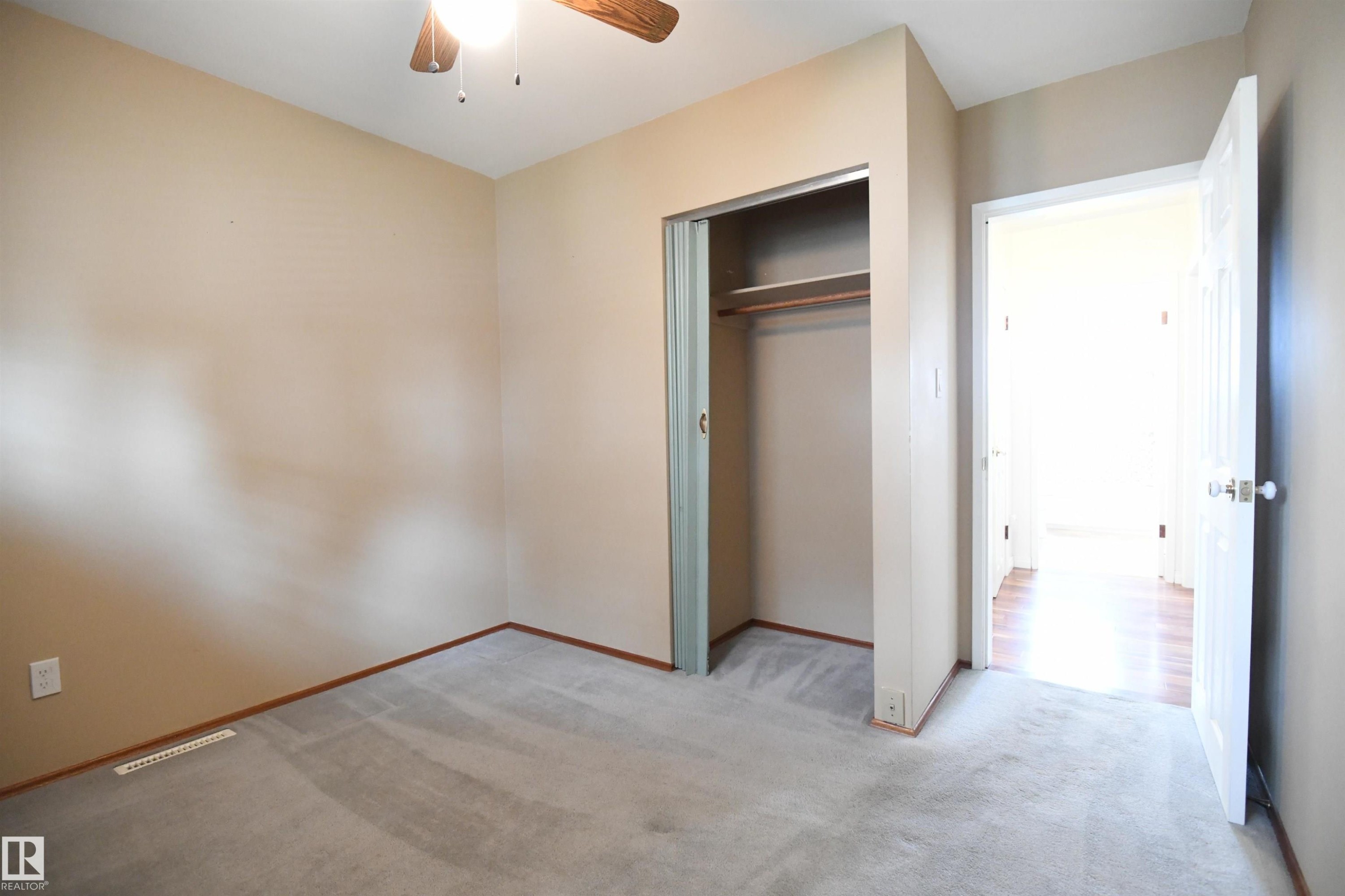 Both the second and third main floor bedrooms are nicely sized, with good closets, and the same upgraded vinyl windows found throughout the main floor - 10243 42 Street Nw, Edmonton, AB