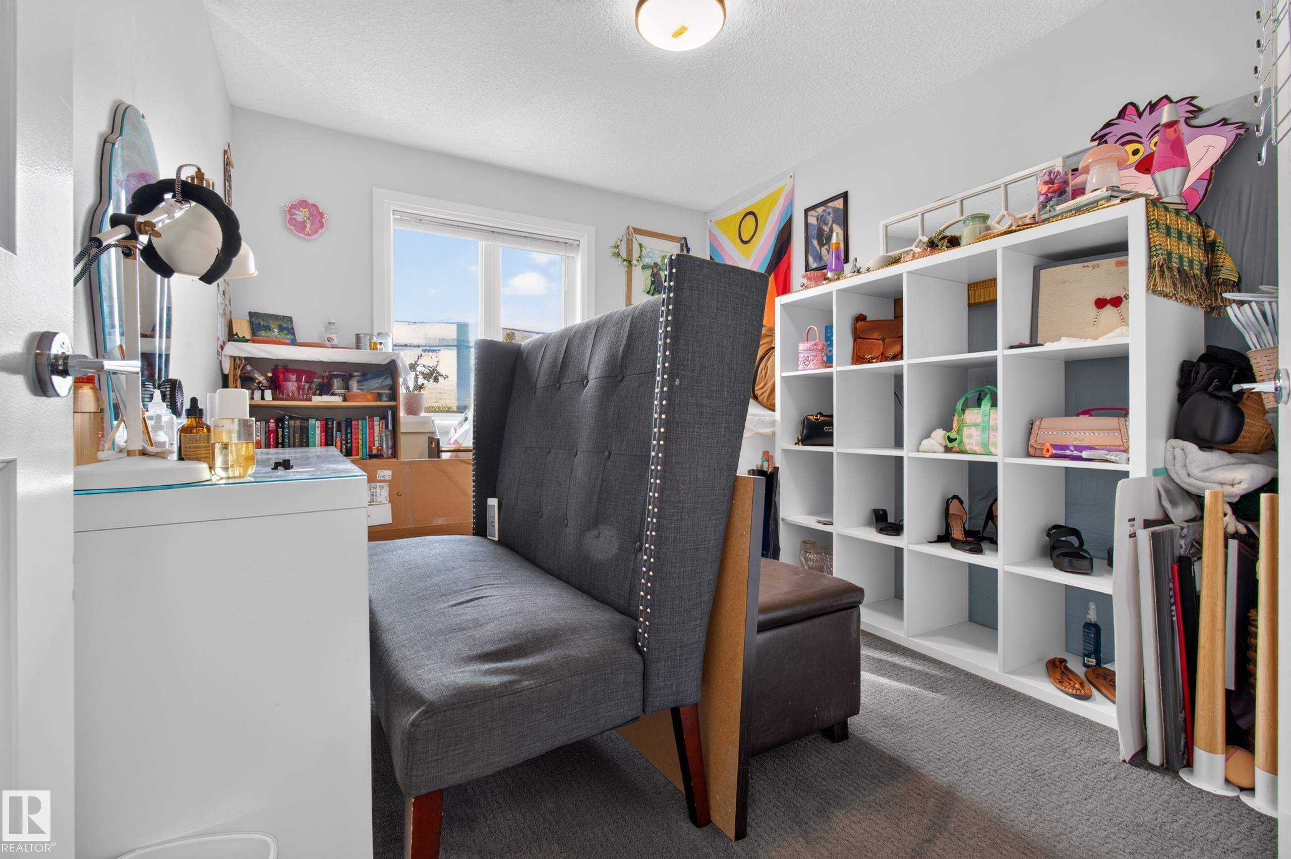 Recessed lighting, wall-mounted shelving, and a large window providing natural light - 11167 62 Avenue Nw, Edmonton, AB