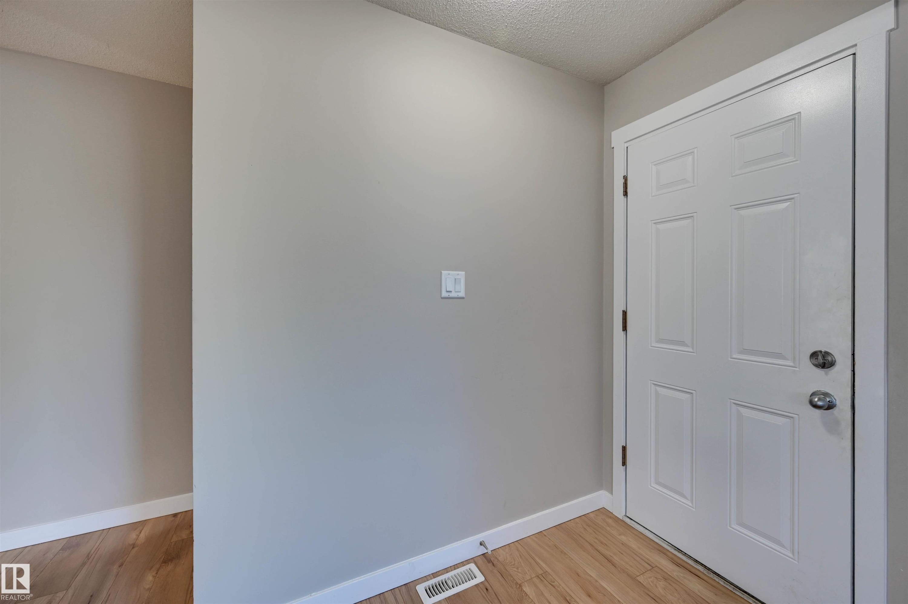 Panel door with brushed nickel hardware - 13815 88 Street Nw, Edmonton, AB