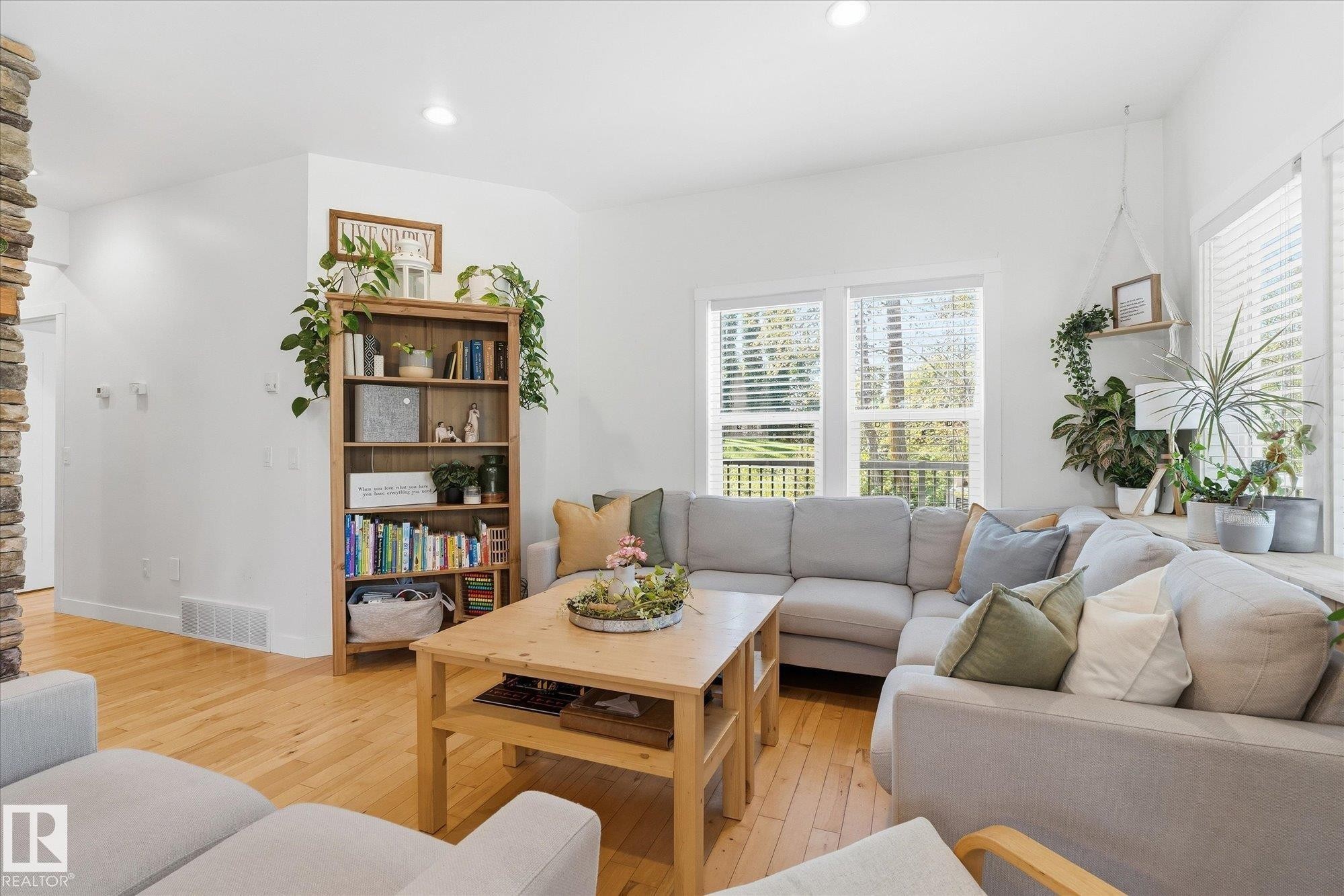 Light wood-finish flooring, recessed lighting, white walls, and multiple windows - #45 53122 Rge Road 14, Rural Parkland County, AB