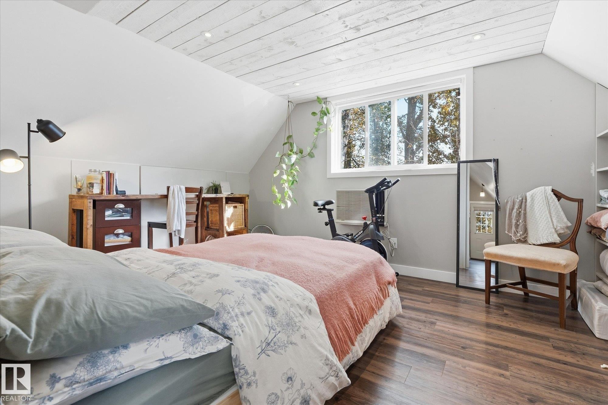 Wood-finish flooring, white shiplap ceiling, recessed lighting, and a large window - #45 53122 Rge Road 14, Rural Parkland County, AB