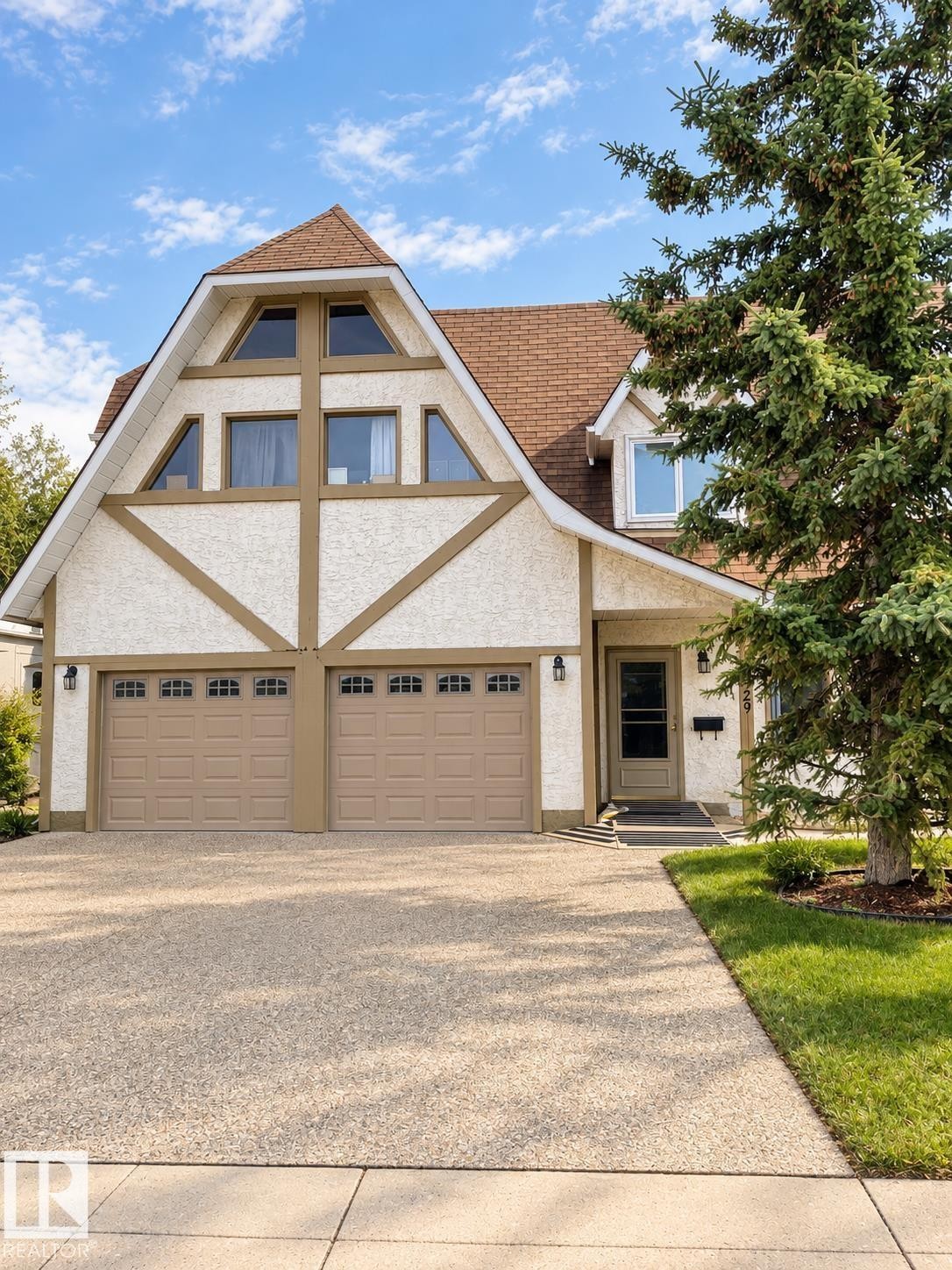 Gable roof structure with dormer windows - 18929 99A Avenue Nw, Edmonton, AB