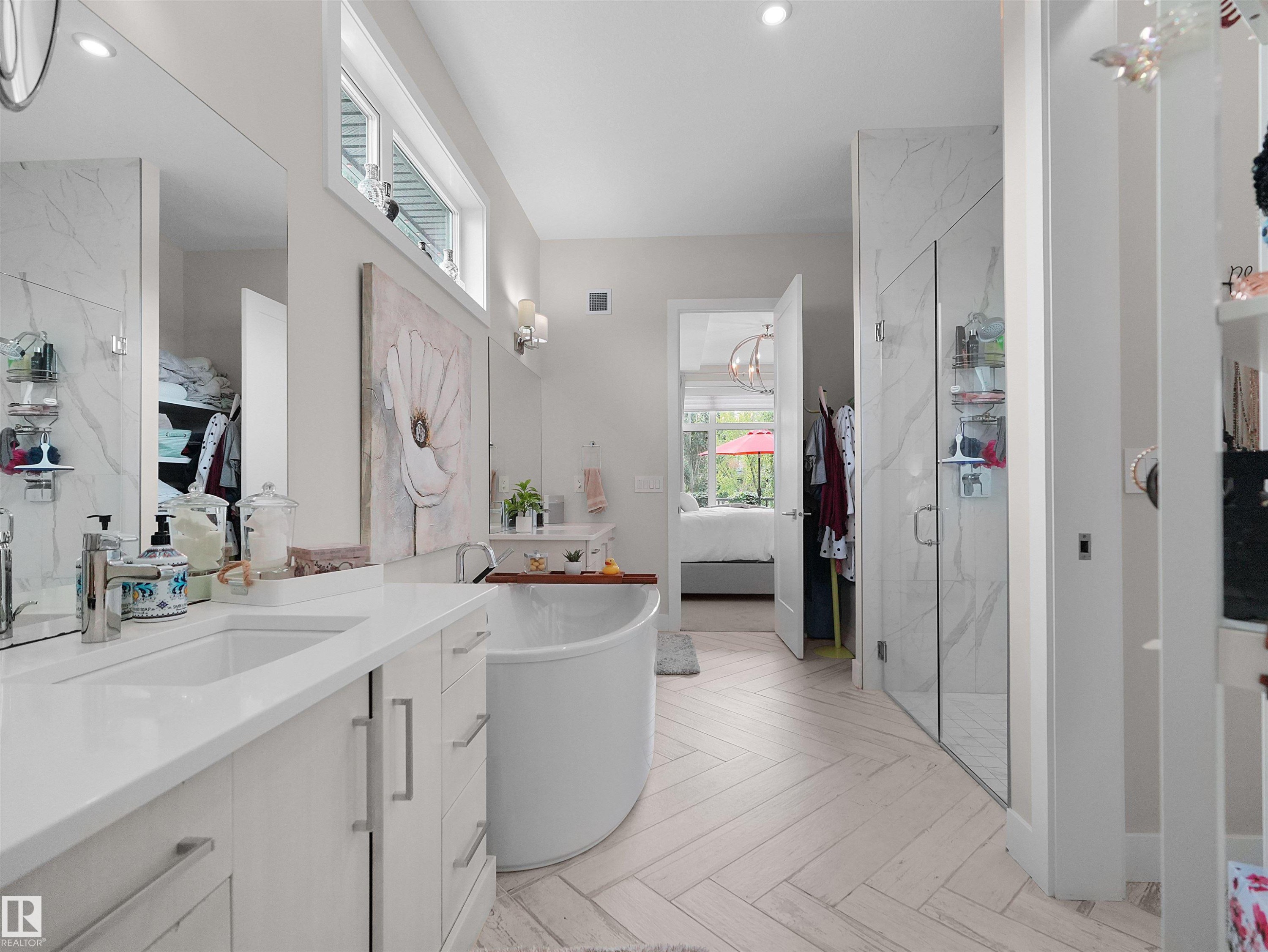 Dual vanity with undermount sinks, white cabinetry, and polished chrome fixtures - 904 Wood Place Nw, Edmonton, AB