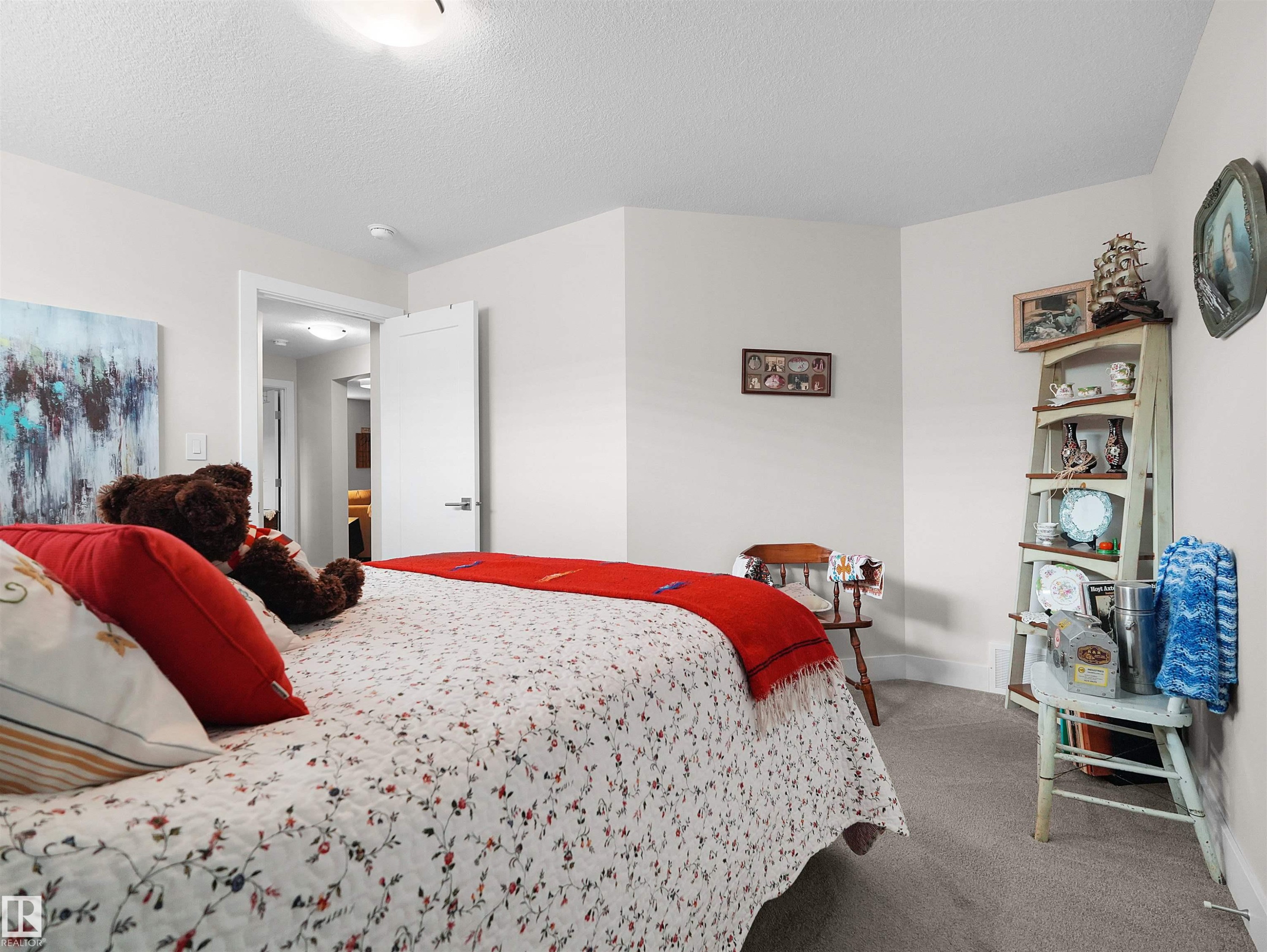 Recessed lighting, light gray carpeting, and painted interior walls - 904 Wood Place Nw, Edmonton, AB