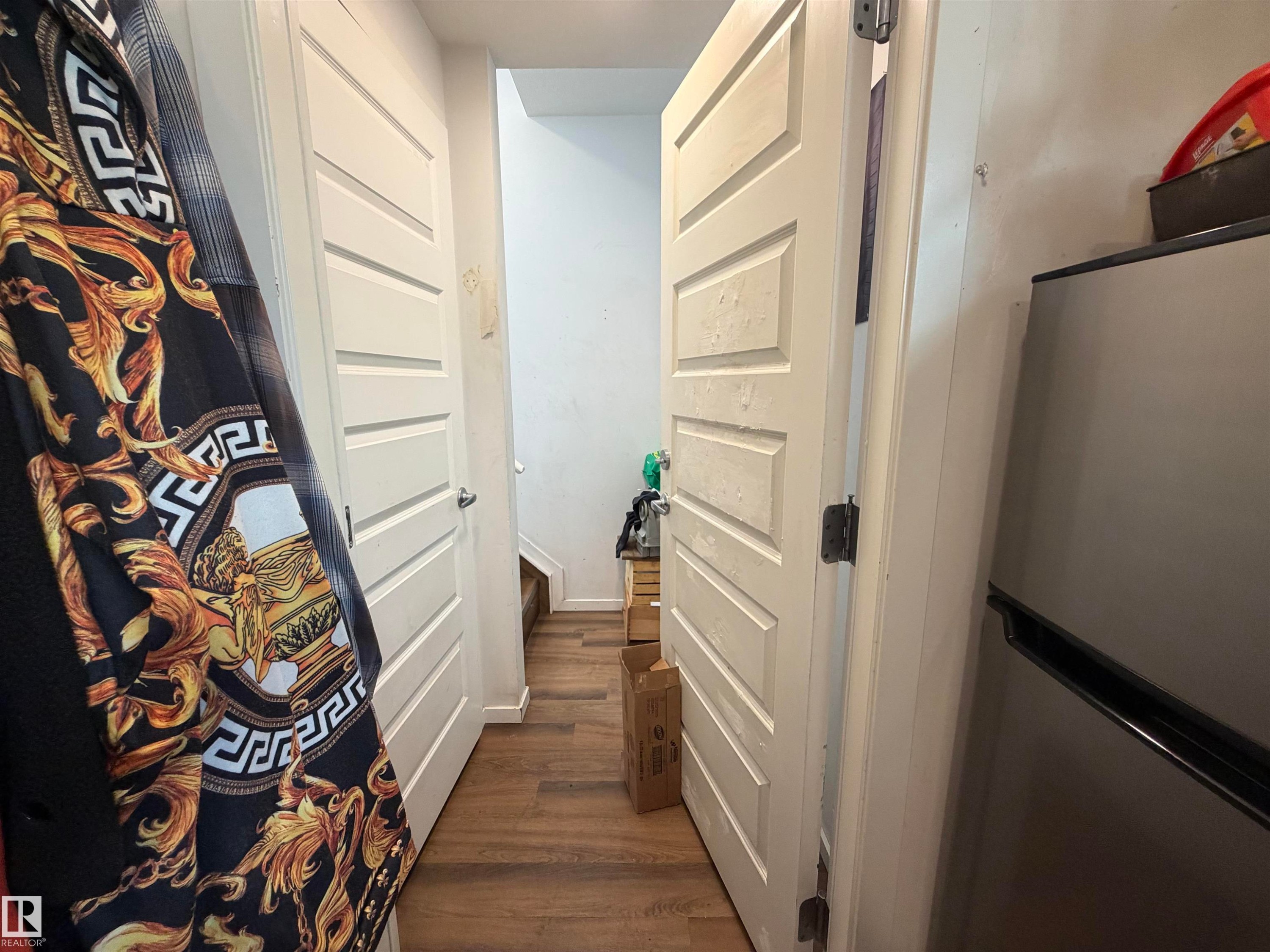 Wood-finish flooring throughout - 11442 82 Street Nw, Edmonton, AB