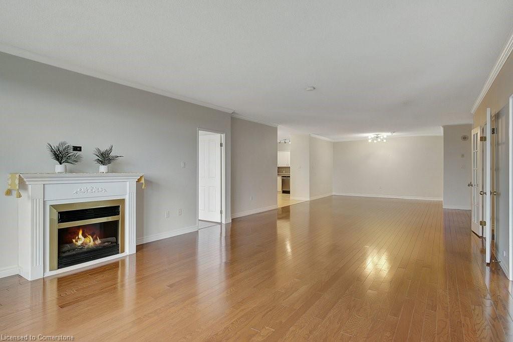 805-255 Keats Way, Waterloo, ON - Indoor Photo Showing Living Room With Fireplace