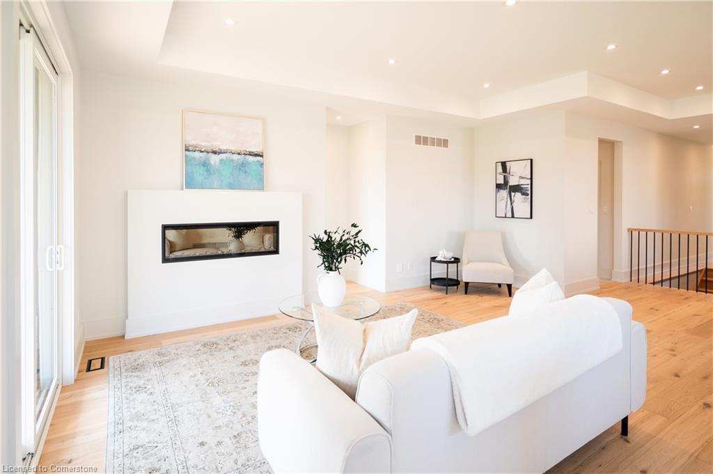 19 Oakley Drive, Niagara-On-The-Lake, ON - Indoor Photo Showing Living Room With Fireplace
