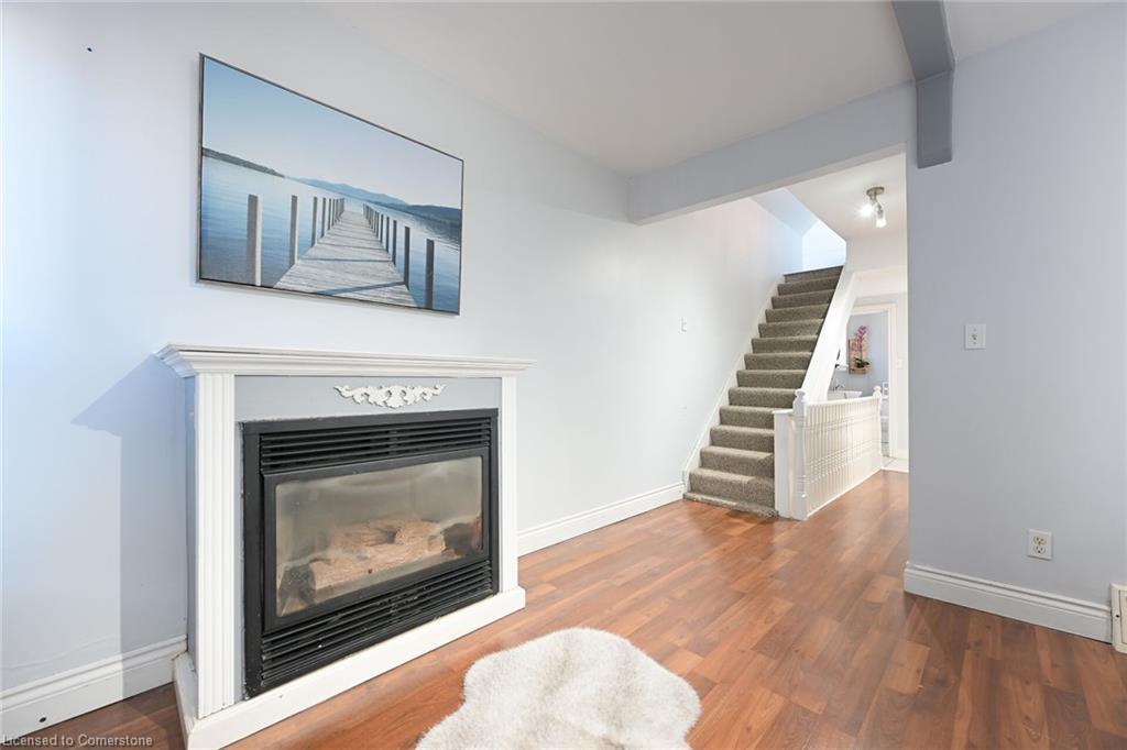 200 Kensington Avenue N, Hamilton, ON - Indoor Photo Showing Living Room With Fireplace