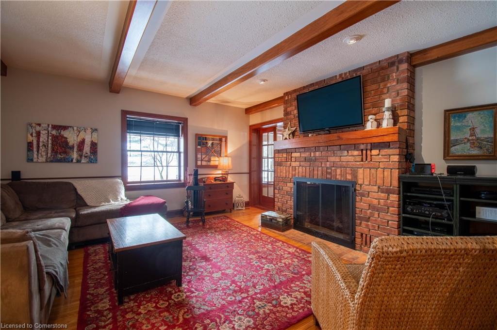 145175 Potters Road, Tillsonburg, ON - Indoor Photo Showing Living Room With Fireplace