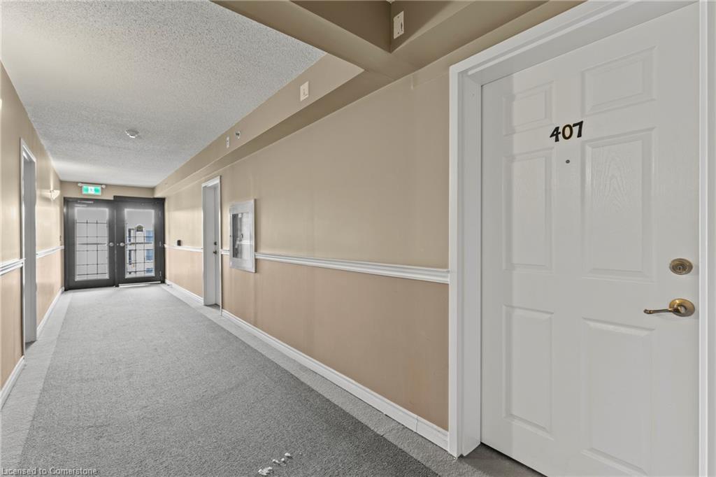 407-2075 Appleby Line, Burlington, ON - Indoor Photo Showing Other Room