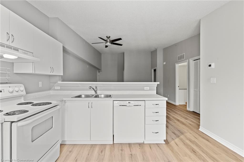 407-2075 Appleby Line, Burlington, ON - Indoor Photo Showing Kitchen With Double Sink