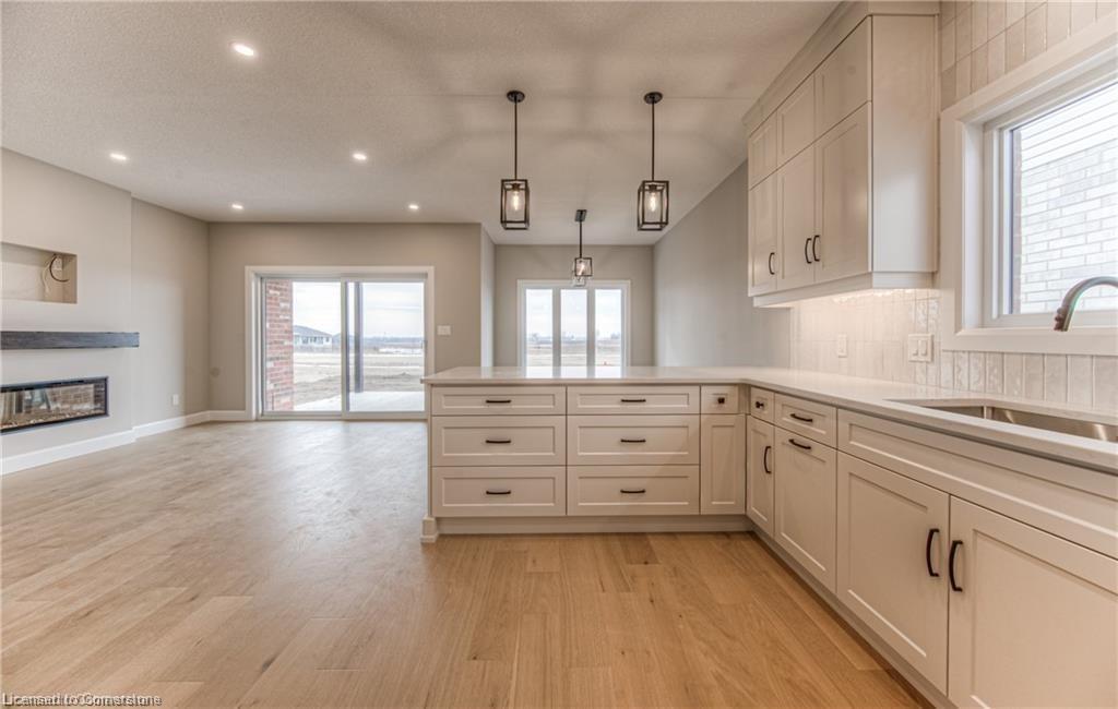 59 Weymouth Street, Elmira, ON - Indoor Photo Showing Kitchen With Fireplace