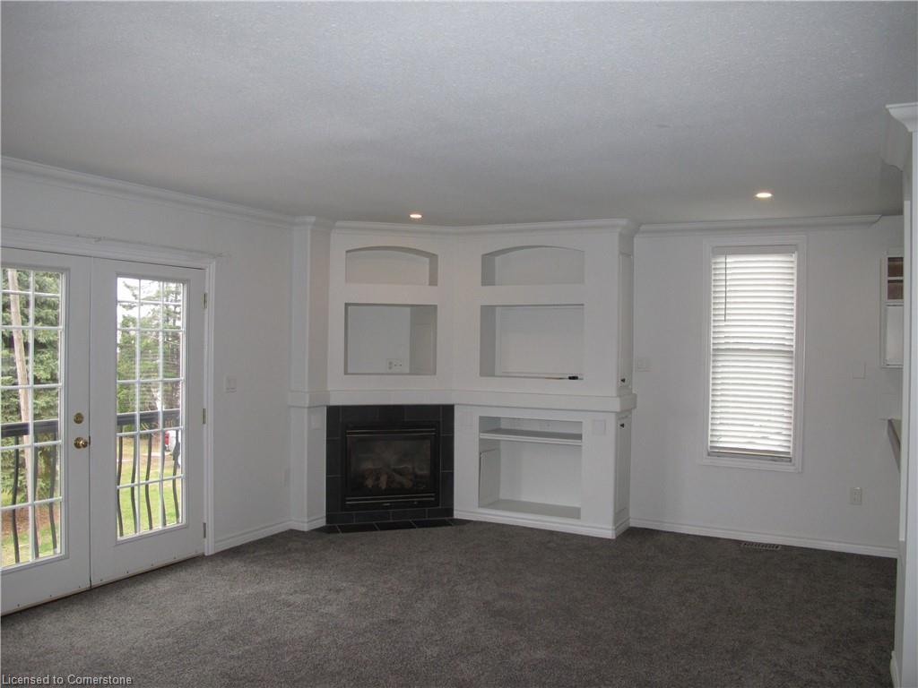 4233 May Avenue, Niagara Falls, ON - Indoor Photo Showing Living Room With Fireplace