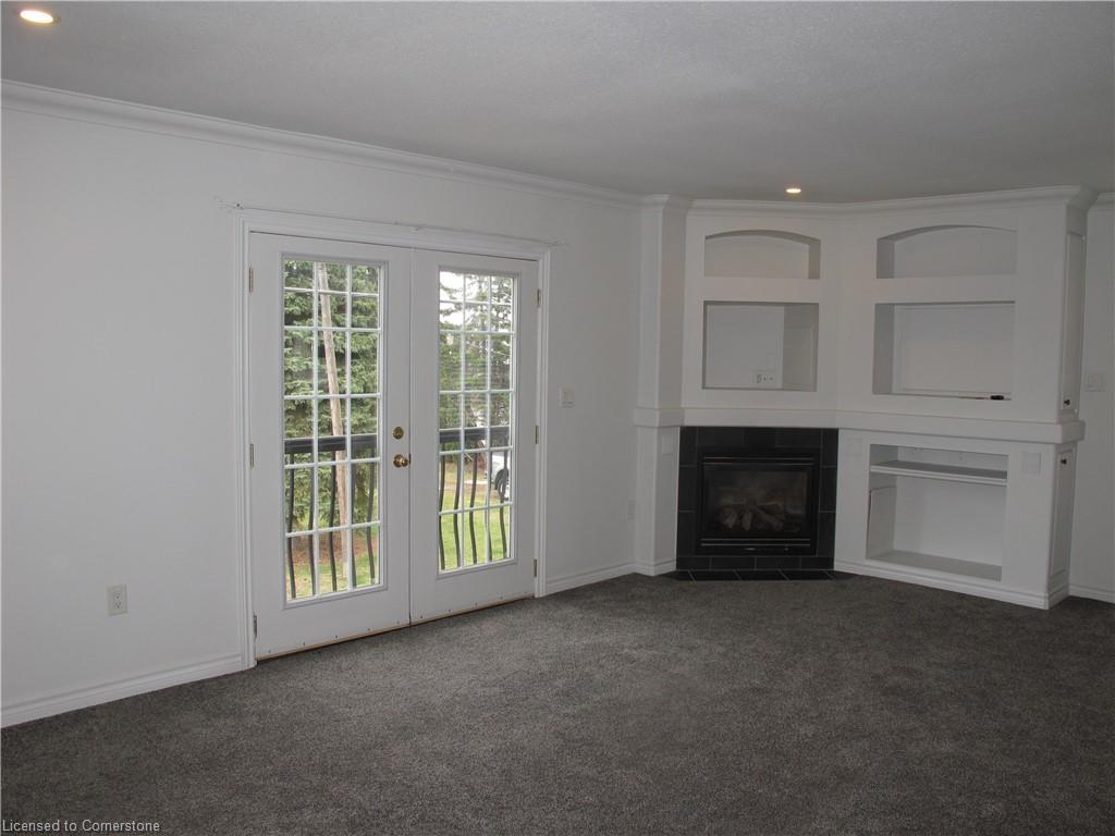 4233 May Avenue, Niagara Falls, ON - Indoor Photo Showing Living Room With Fireplace