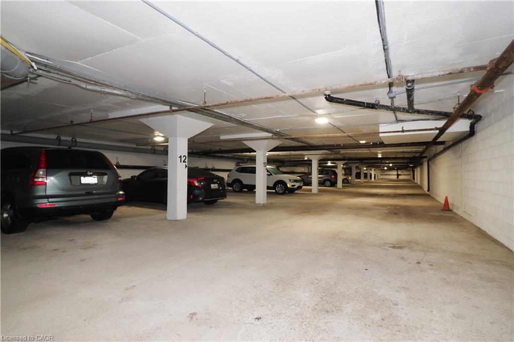 902-65 Westmount Road N, Waterloo, ON - Indoor Photo Showing Garage