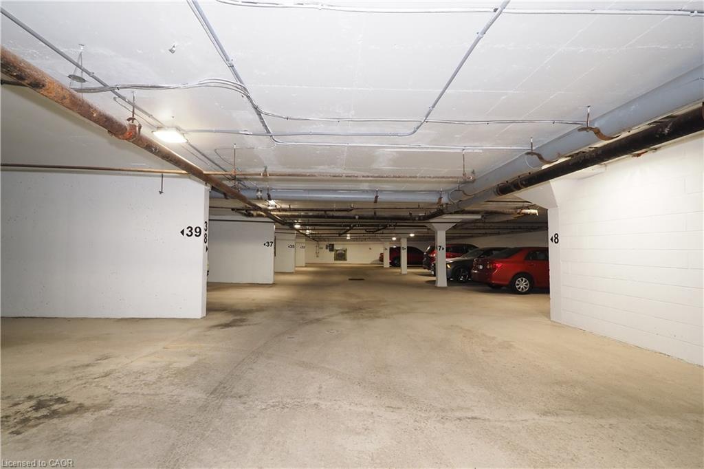 902-65 Westmount Road N, Waterloo, ON - Indoor Photo Showing Garage