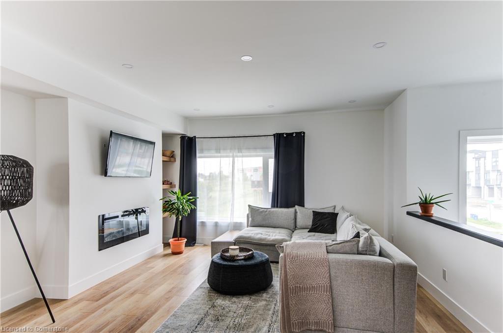 14-4222 Lismer Lane, London, ON - Indoor Photo Showing Living Room With Fireplace