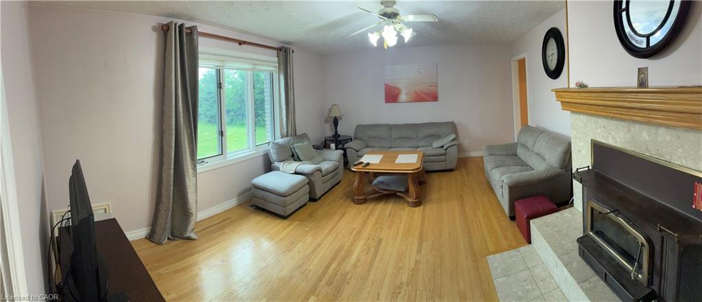3088 Haldimand 9 Road, York, ON - Indoor Photo Showing Living Room With Fireplace