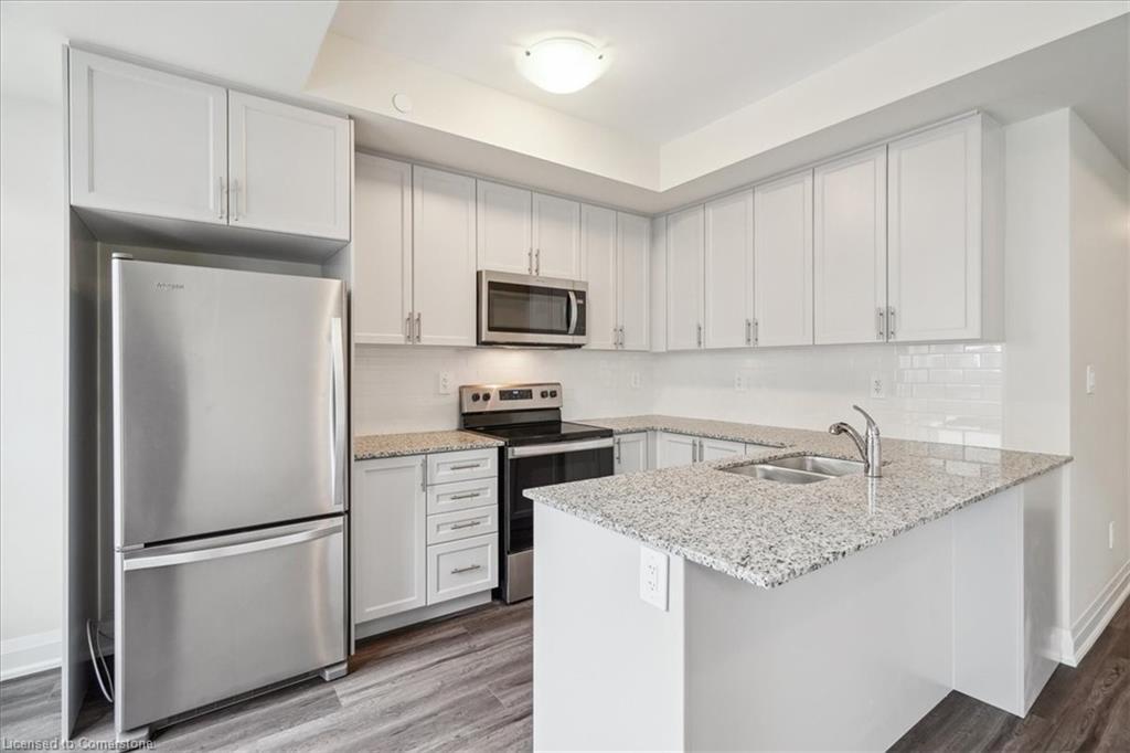 105-1593 Rose Way, Milton, ON - Indoor Photo Showing Kitchen With Double Sink With Upgraded Kitchen