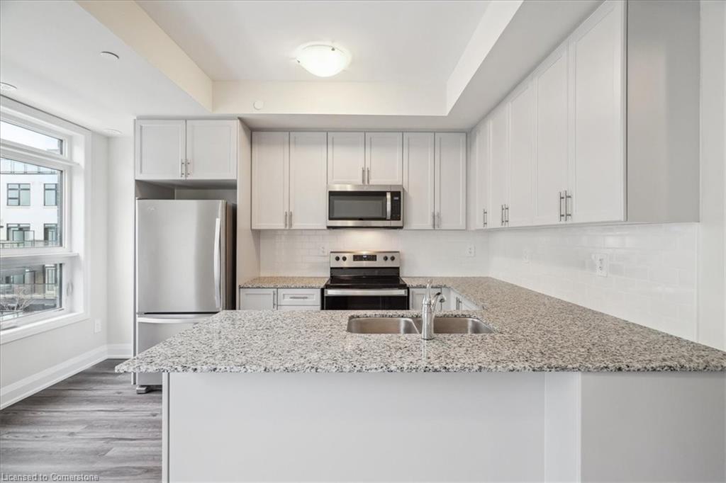 105-1593 Rose Way, Milton, ON - Indoor Photo Showing Kitchen With Double Sink With Upgraded Kitchen