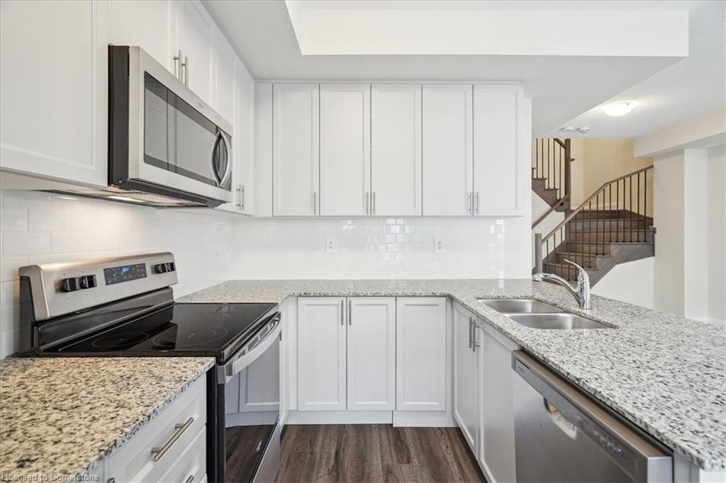 105-1593 Rose Way, Milton, ON - Indoor Photo Showing Kitchen With Double Sink With Upgraded Kitchen